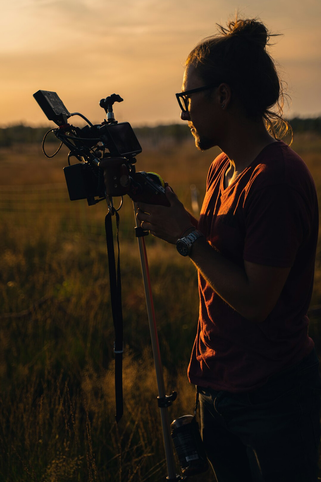 filmmaker recording sounds outdoors
